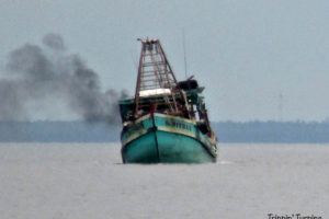 Pontianac, Kalimantan, Borneo, Indonesia, ship on a lean